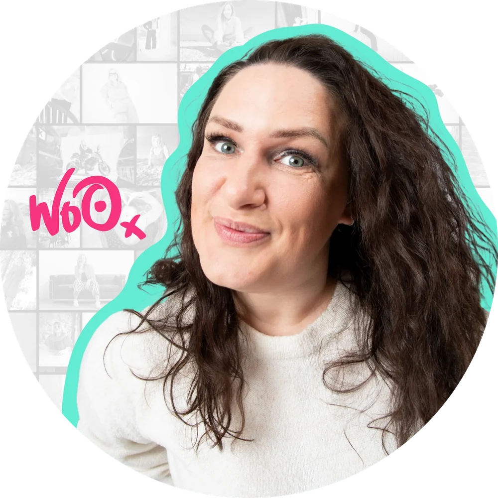 Wendy ‘wo0’ Gannon, UK personal branding photographer, with long dark wavy hair and a cream jumper, smiling cheekily next to the pink wo0 logo